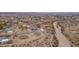 Aerial view of new homes in a desert community at 125 Ironwood Pl, Wickenburg, AZ 85390