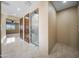 Bright bathroom with shower and double doors at 125 Ironwood Pl, Wickenburg, AZ 85390