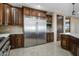 Kitchen with stainless steel appliances and custom cabinetry at 125 Ironwood Pl, Wickenburg, AZ 85390