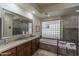 Bathroom boasts a large soaking tub and walk-in shower at 11736 E Del Timbre Dr, Scottsdale, AZ 85259