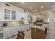 Spacious kitchen featuring granite countertops, stainless steel appliances, and an island at 11736 E Del Timbre Dr, Scottsdale, AZ 85259