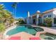 Inviting backyard oasis featuring a sparkling pool and spa at 11736 E Del Timbre Dr, Scottsdale, AZ 85259