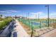 Community pickleball courts with seating and shade at 1223 W Sparrow Dr, Queen Creek, AZ 85140