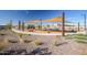 Community playground with shade sails and a play structure at 1223 W Sparrow Dr, Queen Creek, AZ 85140