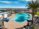 Community pool with lounge chairs and shade structures at 1223 W Sparrow Dr, Queen Creek, AZ 85140