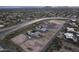 Aerial view showcasing a luxury home with a pool and desert landscape at 12331 E Gold Dust Ave, Scottsdale, AZ 85259