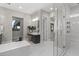 Bright bathroom with a large walk-in shower and marble finishes at 12331 E Gold Dust Ave, Scottsdale, AZ 85259