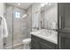 Spa-like bathroom with walk-in shower, quartz countertop, and modern vanity at 12331 E Gold Dust Ave, Scottsdale, AZ 85259