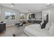 Main bedroom with kitchenette, sitting area, and large window at 12331 E Gold Dust Ave, Scottsdale, AZ 85259