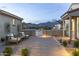 Courtyard with mountain views, brick pavers, and comfortable seating at 12331 E Gold Dust Ave, Scottsdale, AZ 85259