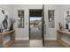 Bright entryway with open door revealing mountain views and courtyard at 12331 E Gold Dust Ave, Scottsdale, AZ 85259