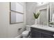 Elegant powder room with modern vanity and tile at 12331 E Gold Dust Ave, Scottsdale, AZ 85259