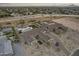 Bird's-eye view of a luxury estate, showcasing a large pool and manicured lawn at 12347 E Gold Dust Ave, Scottsdale, AZ 85259