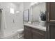 Spa-like bathroom with a walk-in shower and modern vanity at 12347 E Gold Dust Ave, Scottsdale, AZ 85259