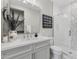 Contemporary bathroom with gray vanity and shower at 12347 E Gold Dust Ave, Scottsdale, AZ 85259