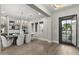 Open concept dining room with a view of the backyard and entryway at 12347 E Gold Dust Ave, Scottsdale, AZ 85259