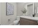 Stylish powder room with modern vanity and fixtures at 12347 E Gold Dust Ave, Scottsdale, AZ 85259