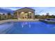 Stunning pool with adjacent spa and expansive patio at 12347 E Gold Dust Ave, Scottsdale, AZ 85259