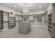 Large walk-in closet with ample shelving and drawers at 12347 E Gold Dust Ave, Scottsdale, AZ 85259