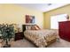 Bedroom with a double bed and red armoire at 1240 W Falls Canyon Dr, Casa Grande, AZ 85122