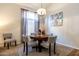 Dining room with round table and four chairs at 1240 W Falls Canyon Dr, Casa Grande, AZ 85122