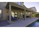 Covered patio overlooks refreshing pool with built-in BBQ at 1240 W Falls Canyon Dr, Casa Grande, AZ 85122