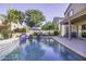 Inviting pool with expansive patio and lush landscaping at 1240 W Falls Canyon Dr, Casa Grande, AZ 85122