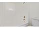 Bathroom featuring a white tub with a brushed nickel shower head at 12474 W Redfield Rd, El Mirage, AZ 85335