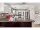 Modern kitchen with stainless steel appliances and ample counter space at 13353 W Port Royale Ln, Surprise, AZ 85379