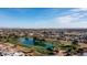 Community view showcasing a golf course and lake at 14202 N Lakeforest Dr, Sun City, AZ 85351