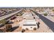 Aerial view showcasing a single-story home with solar panels and a well-maintained yard at 14202 N Lakeforest Dr, Sun City, AZ 85351