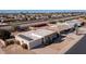 Aerial view of a single-story home with solar panels and a spacious backyard at 14202 N Lakeforest Dr, Sun City, AZ 85351