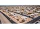 Aerial view of a residential neighborhood with a house featuring a unique backyard design at 14202 N Lakeforest Dr, Sun City, AZ 85351