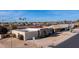 Aerial view of a single-story home with solar panels and a desert landscape at 14202 N Lakeforest Dr, Sun City, AZ 85351