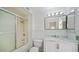 Clean bathroom, featuring a shower/tub, white vanity, and mirror at 14202 N Lakeforest Dr, Sun City, AZ 85351