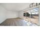 Bright dining room with sliding glass doors leading to the backyard at 14202 N Lakeforest Dr, Sun City, AZ 85351