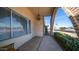 Covered entryway with brick columns and view of the street at 14202 N Lakeforest Dr, Sun City, AZ 85351