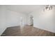 Bright and airy living room with wood-look floors at 14202 N Lakeforest Dr, Sun City, AZ 85351