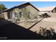 Backyard view showing a gravel area and home's exterior at 1435 S Spartan St, Gilbert, AZ 85233