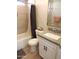 Clean bathroom featuring a tub, toilet, and modern vanity at 1435 S Spartan St, Gilbert, AZ 85233