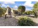 Backyard view, showing desert landscaping and patio at 14408 W Corral Dr, Sun City West, AZ 85375