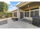 Covered patio with paver stones and built-in grill at 14408 W Corral Dr, Sun City West, AZ 85375