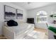 Bright bedroom featuring a daybed and city skyline art at 1638 E Hackamore St, Mesa, AZ 85203