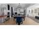 Elegant dining room with a dark wood table and navy blue velvet chairs at 1638 E Hackamore St, Mesa, AZ 85203