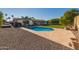 Relaxing pool area with ample space for sunbathing at 1638 E Hackamore St, Mesa, AZ 85203