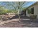 Landscaped backyard with desert landscaping and gravel at 16464 W Piccadilly Rd, Goodyear, AZ 85395