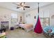 Charming bedroom with a twin bed and playful decor at 1705 S 82Nd Pl, Mesa, AZ 85209