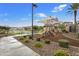 Community playground with shaded play area at 1705 S 82Nd Pl, Mesa, AZ 85209