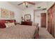 Bright bedroom with a large bed and ample closet space at 1740 W Del Rio St, Chandler, AZ 85224