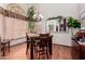 Bright dining room with hardwood floors, large window, and a chandelier at 1740 W Del Rio St, Chandler, AZ 85224